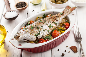 Baked fish trout with vegetables
