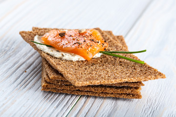 Canape with smoked salmon and crackers