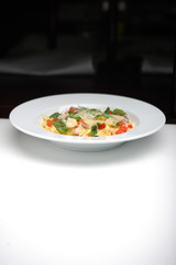 Pasta with pomegranate, parmesan cheese and mint