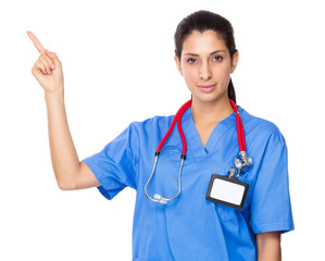 Female doctor showing finger up