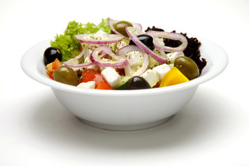 Greek salad in white plate