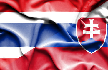 Waving flag of Slovakia and Thailand