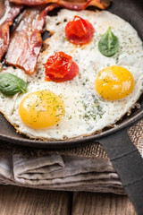 Fried eggs with bacon