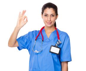 Doctor woman showing the ok sign gesture