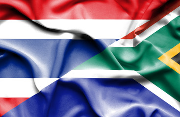 Waving flag of South Africa and Thailand