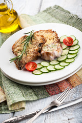 Fried pork chops with vegetables