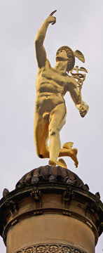 Stuttgart, Germany - golden Hermes statue on a column near Schlossplatz