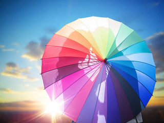 Obraz premium Romantic couple kissing behind the umbrella