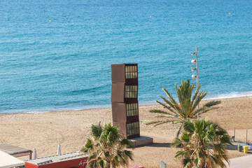 Naklejka premium Top view to the Barceloneta beach. The beach is very popular among young tourists, who visit Barcelona. The beach is in close to down town and very famou