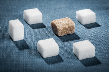 White and brown sugar cubes closeup
