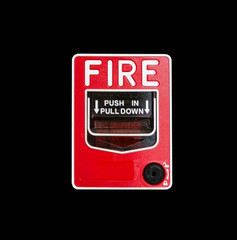 Fototapeta premium fire break glass Fire alarm in the alarm isolated on black background