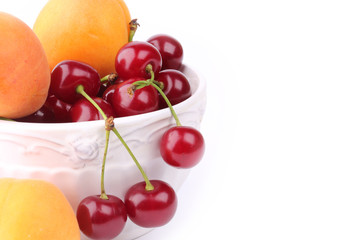Cherry Apricot vintage ceramic bowl isolated white background fruits