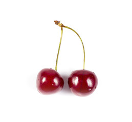 A pair of cherries isolated on white