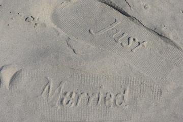 just married foot step  in sand, honeymoon