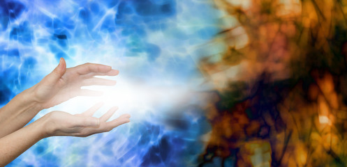 Dispersing Negative Energies -  Female hands on water blue background with stream of white energy...