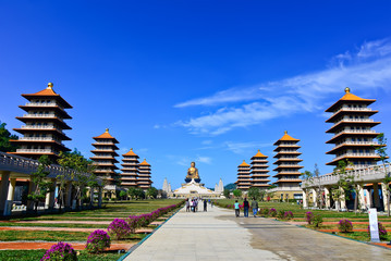Chinese temples and a golden Buddha statue in Kaohsiung, Taiwan.