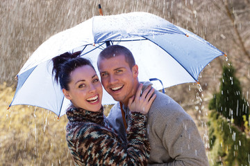 Couple enjoying the rain