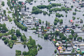 Flooded village in lowland of Great river