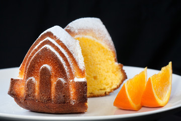 Round cake with orange slices
