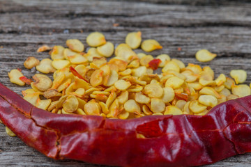 Peppers drying on a white background