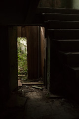 Fototapeta na wymiar doorway and stairway abandoned building