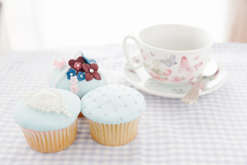 Cupcakes and white cup