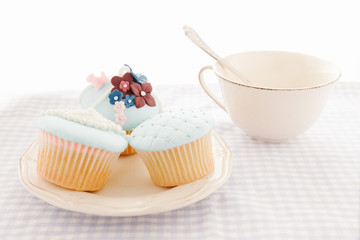 Cupcakes and white cup