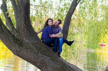 family dad mother and daughter on a walk on nature