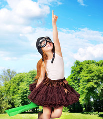 Adorable young girl as a pilot