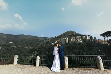 Obraz premium stylish beautiful romantic couple on a background of beautiful m