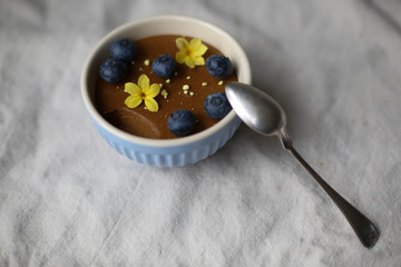 Liquorice Pannacotta with Berries and Crushed Meringues