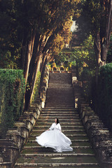 beautiful stylish italian brunette bride on the background long