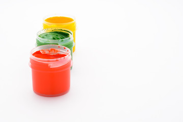 Paint in jars and brush