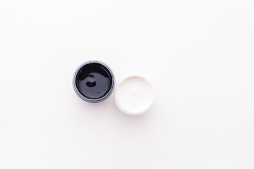 Paint in jars and brush