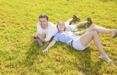 Modern Lifestyle: Relaxing Caucasian Couple Together Outdoors. J