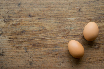 Eggs on wood background
