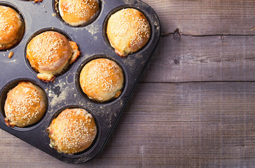 Salty muffins in a baking pan