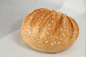 fresh homemade bread  on paper background.