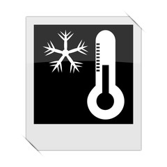 Snowflake with thermometer icon