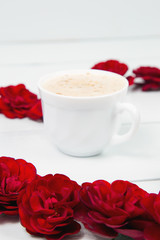 cup of coffee and roses