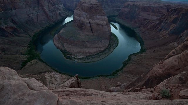 Horseshoe Bend meander of the Colorado River Page Arizona pan Up