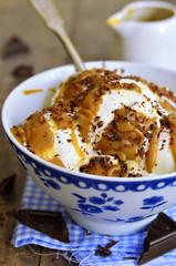 Vanilla ice cream with caramel and chocolate.