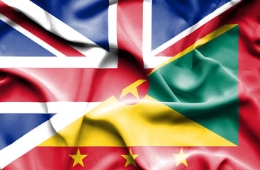 Waving flag of Guernsey and Great Britain