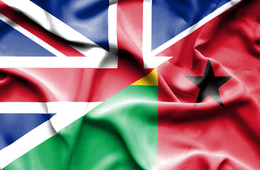 Waving flag of Guinea Bissau and Great Britain