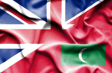 Waving flag of Maldives and Great Britain