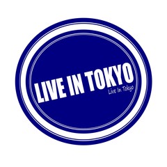 LIVE IN TOKYO white stamp text on blue