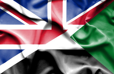 Waving flag of Sudan and Great Britain