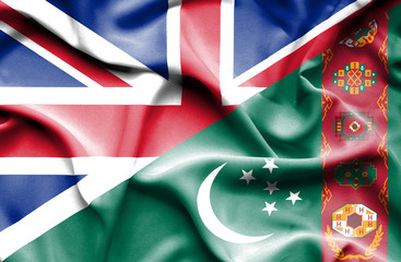 Waving flag of Turkmenistan and Great Britain