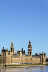 Fototapeta na wymiar Big Ben London clock tower houses of parliament with river thames photo vertical