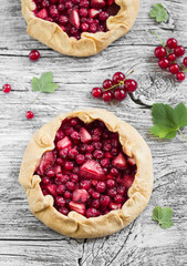 berry pie on a light wooden background